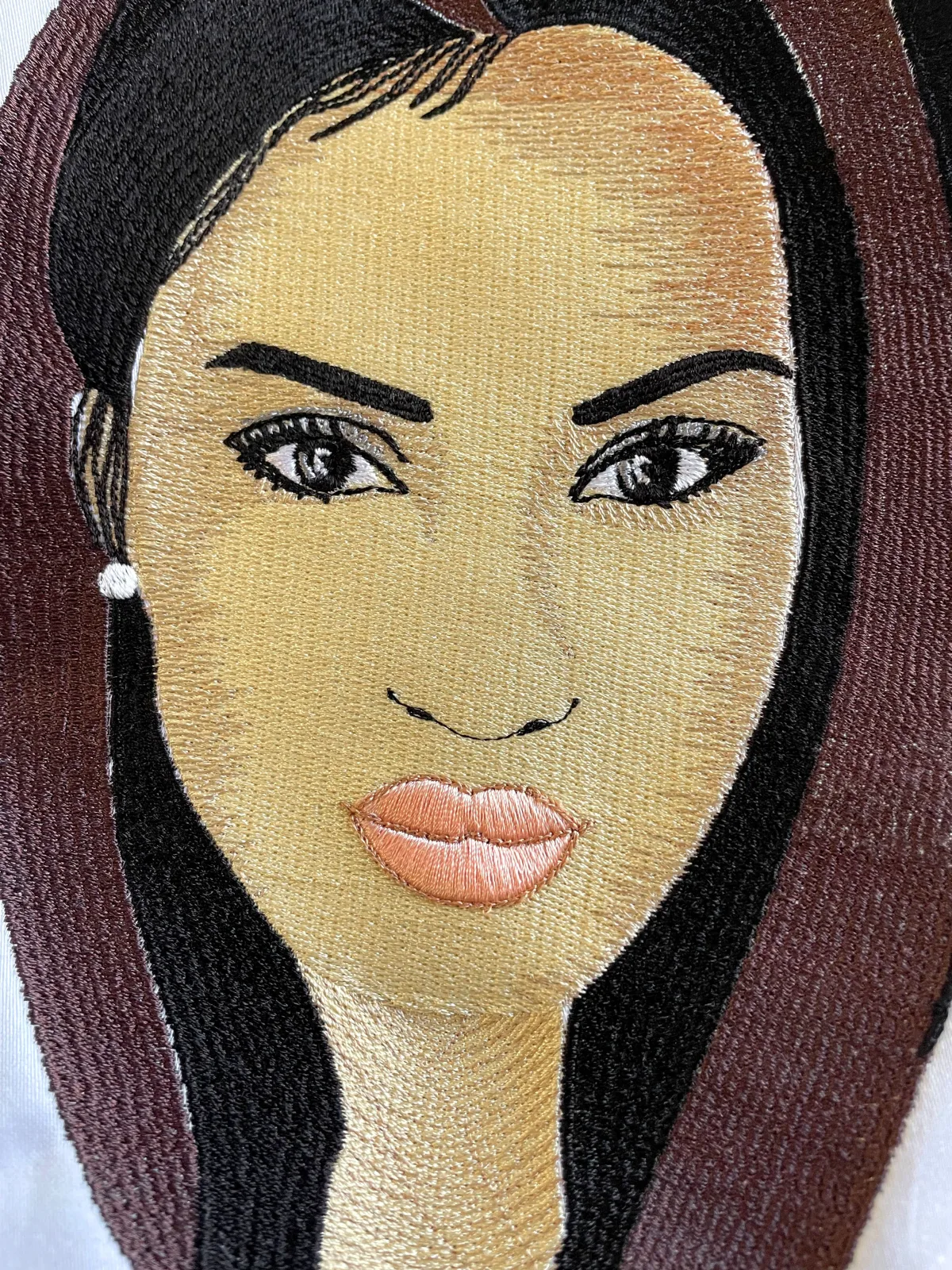 Embroidered branding on a textile product